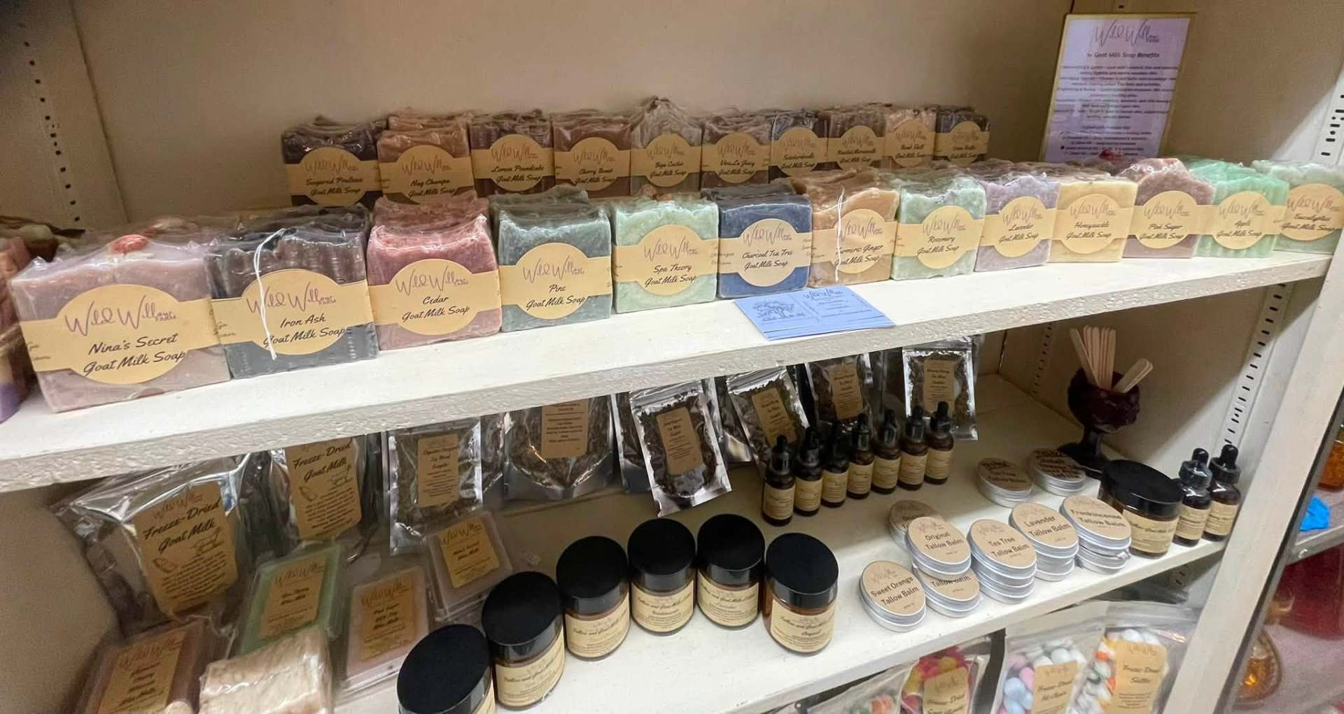 Wild Willow Farm handmade goat milk soap bars lined up on a shelf
